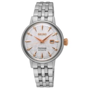 Questa è l'immagine frontale dell'orologio seiko presage cocktail lady con uqadrante bianco, indici e lancette rosate e 8 diamanti per gli indici